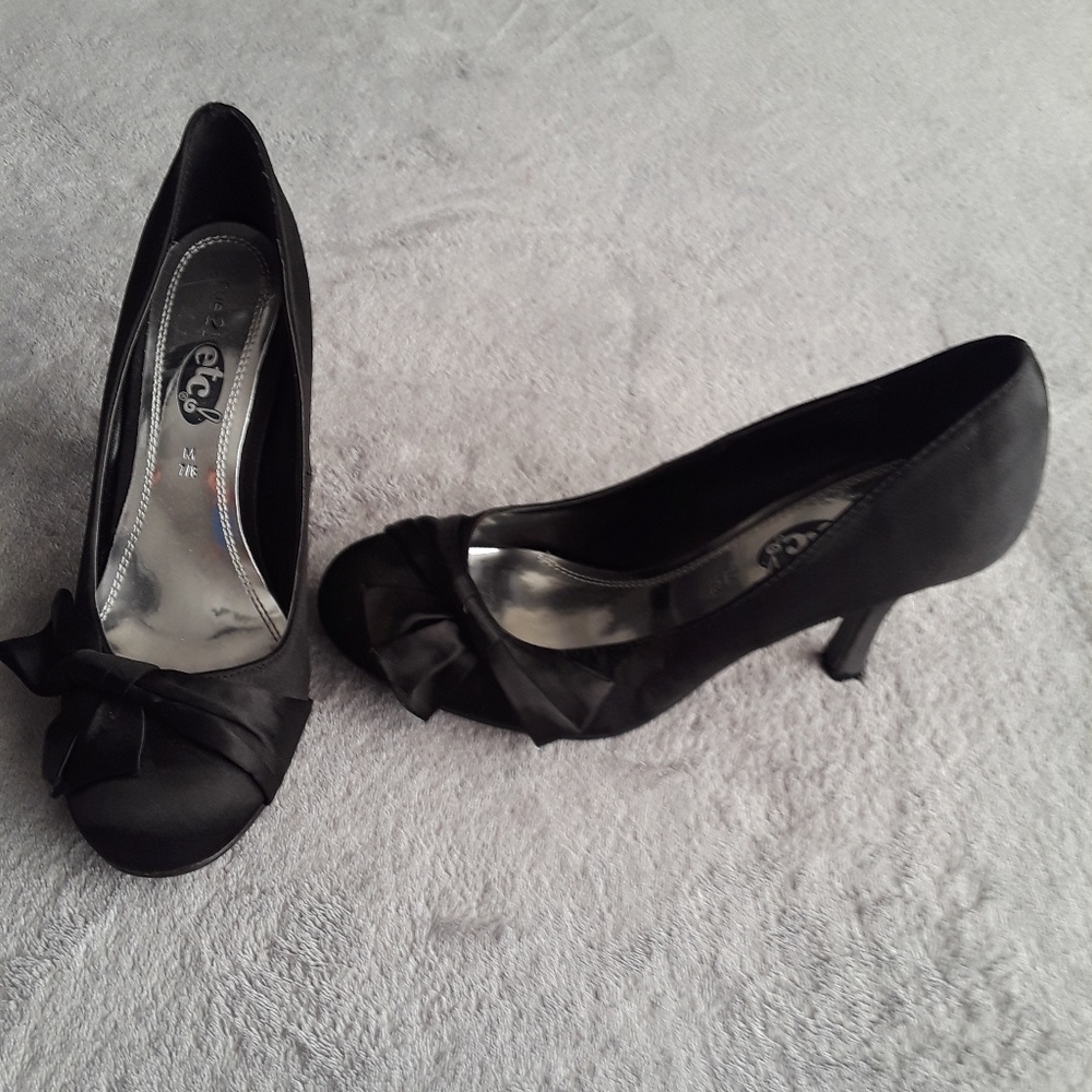 Black never worn w/o tags